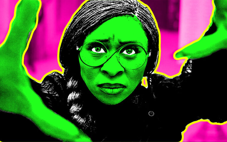 Cynthia Eviro as Elphaba in Wicked. Her head and upper body are visible. Her hands are up, out of focus, and partially out of frame. The image has been desaturated and recolored. She has bright green face and hands, and there is a yellow line around her. The background is hot pink.