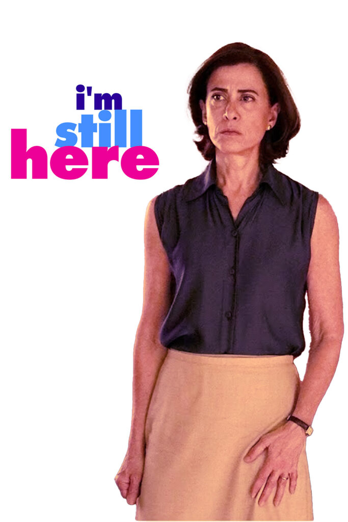 A picture of Fernanda Torres starting just above her knees, wearing a dark blue sleeveless blouse and a tan skirt. She is on the right side of a white background. on the left are the words "i'm still here" stacked haphazardly on each other.